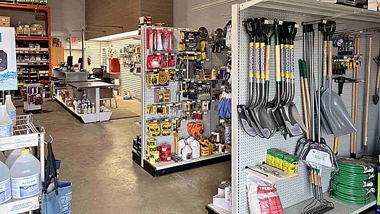 Store stocked with gardenware and hardware tools showcasing NSJ Wholesale products in South Africa